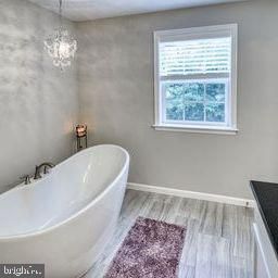 Bathroom, Free Standing Baths, Interior, Pendant Lights, Wood Texture Flooring
