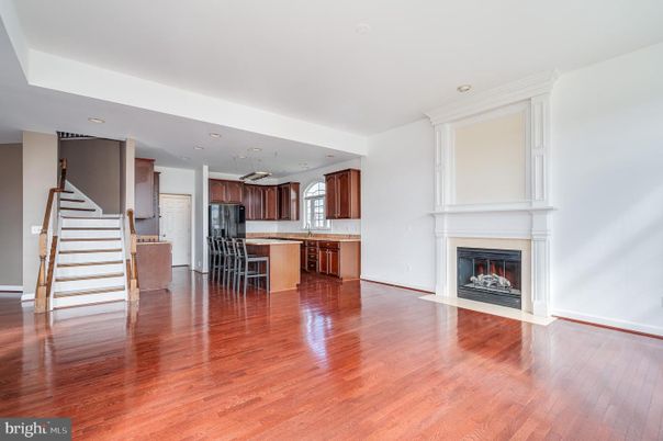Fireplace, Interior, Kitchen, Recessed Lighting, Wood Texture Flooring