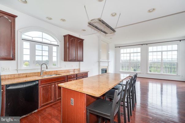 Fireplace, Interior, Kitchen, Recessed Lighting, Wood Texture Flooring