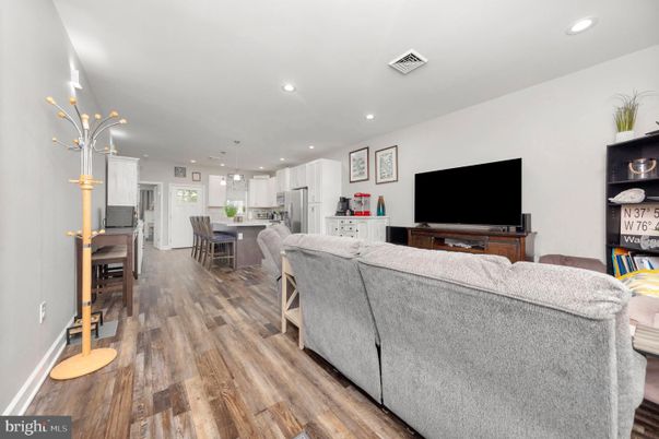 Dining room, Interior, Kitchen, Living room, Pendant Lights, Recessed Lighting, Stainless Steel Appliances, Wood Texture Flooring