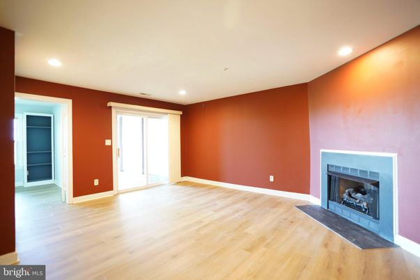Empty room, Fireplace, Interior, Recessed Lighting, Wood Texture Flooring
