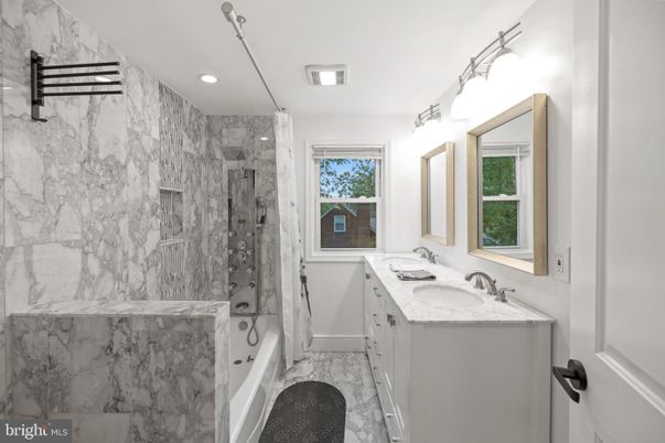 Bathroom, Dual Sink Vanities, Interior, Marble, Marble Walls, Recessed Lighting