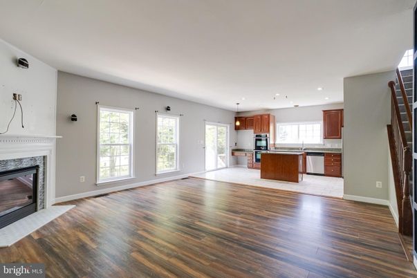Fireplace, Interior, Kitchen, Recessed Lighting, Wood Texture Flooring