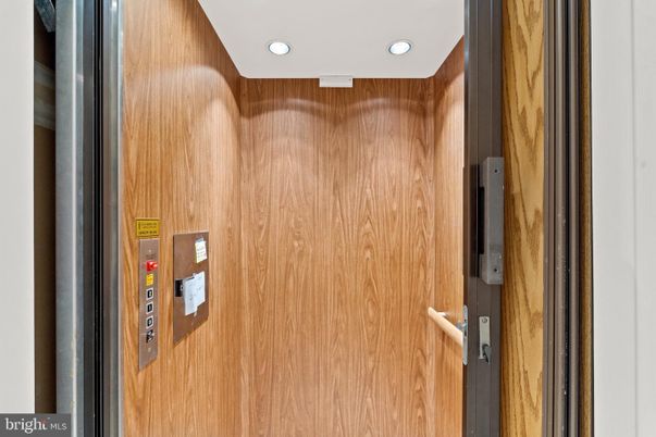 Elevator, Interior, Recessed Lighting, Wooden Walls