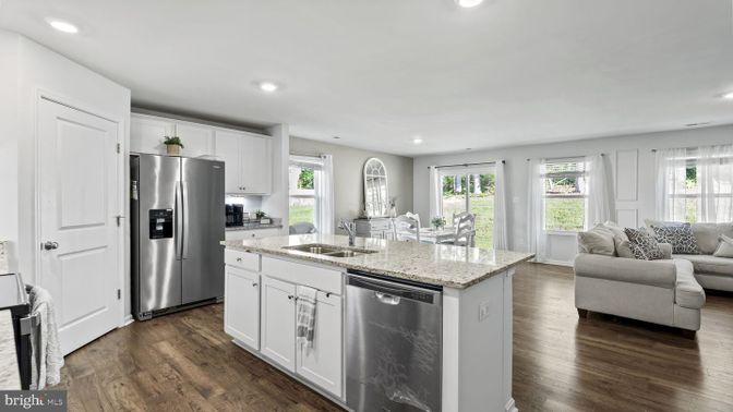 Dining room, Interior, Kitchen, Living room, Recessed Lighting, Stainless Steel Appliances, Wood Texture Flooring