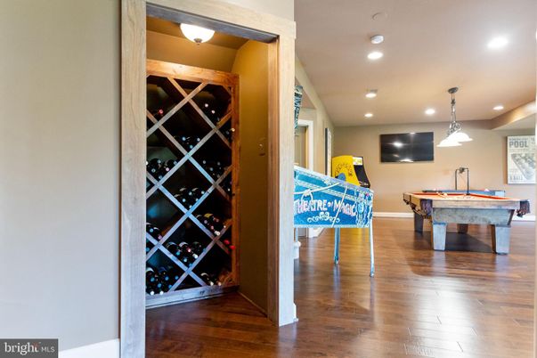Billiard Table, Game Room, Interior, Pendant Lights, Recessed Lighting, Wine Storage, Wood Texture Flooring