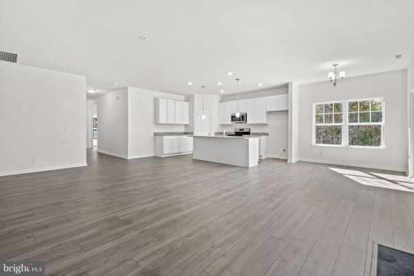 Chandelier, Interior, Kitchen, Pendant Lights, Recessed Lighting, Stainless Steel Appliances, Wood Texture Flooring