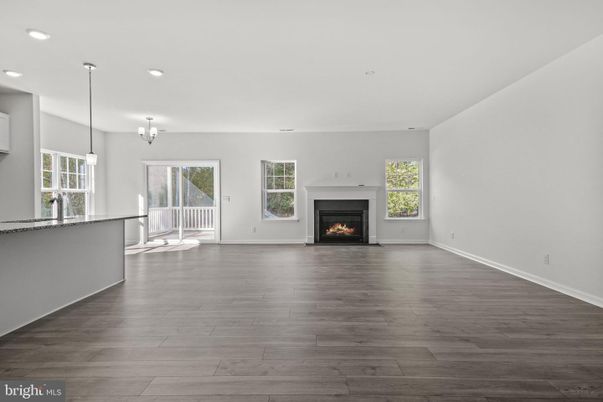 Empty room, Fireplace, Interior, Pendant Lights, Recessed Lighting, Wood Texture Flooring