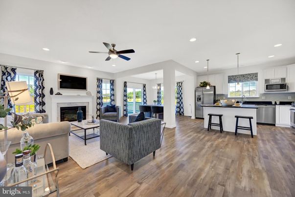 Dining room, Fireplace, Interior, Kitchen, Living room, Pendant Lights, Recessed Lighting, Stainless Steel Appliances, Wood Texture Flooring