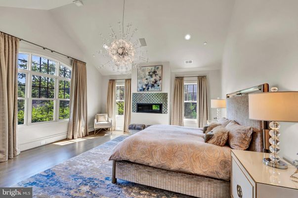 Bedroom, Chandelier, Fireplace, Interior, Recessed Lighting, Wood Texture Flooring