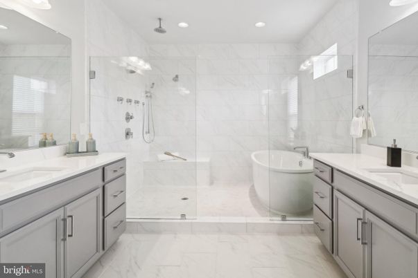 Bathroom, Dual Sink Vanities, Free Standing Baths, Glass Shower, Interior, Marble, Marble Walls, Recessed Lighting