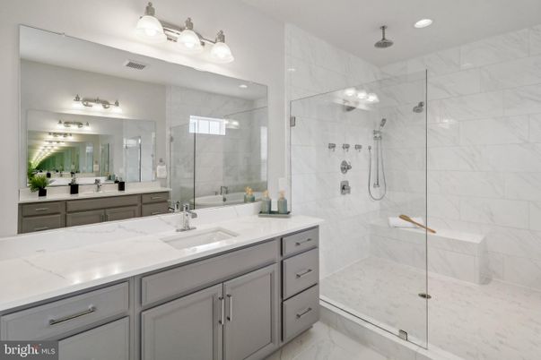 Bathroom, Dual Sink Vanities, Glass Shower, Interior, Marble, Marble Walls, Recessed Lighting