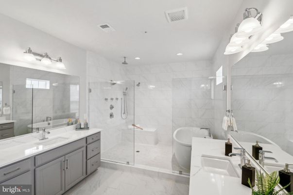 Bathroom, Dual Sink Vanities, Free Standing Baths, Glass Shower, Interior, Marble, Marble Walls, Recessed Lighting