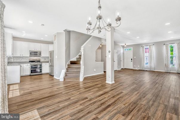Chandelier, Interior, Kitchen, Recessed Lighting, Stainless Steel Appliances, Wood Texture Flooring