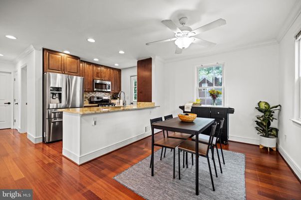 Dining room, Interior, Kitchen, Recessed Lighting, Stainless Steel Appliances, Wood Texture Flooring