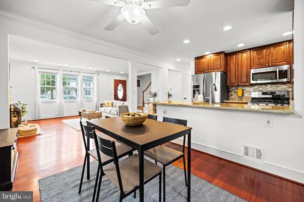 Dining room, Interior, Kitchen, Recessed Lighting, Stainless Steel Appliances, Wood Texture Flooring