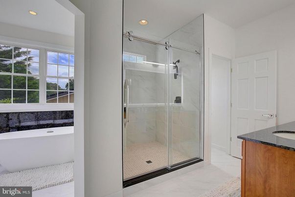 Bathroom, Free Standing Baths, Glass Shower, Interior, Marble Walls, Recessed Lighting