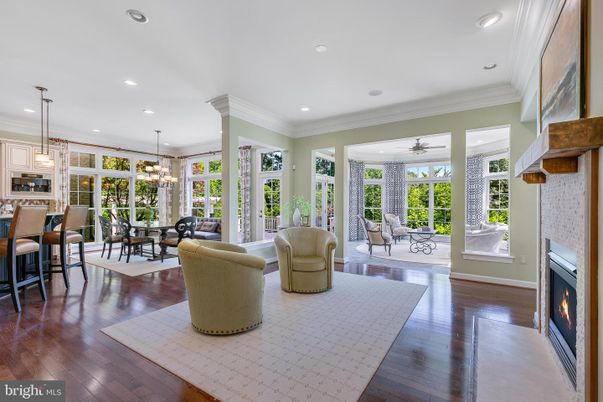Dining room, Fireplace, Interior, Living room, Pendant Lights, Recessed Lighting, Wood Texture Flooring