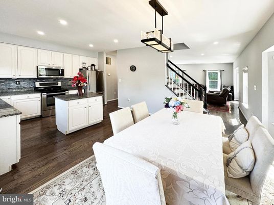 Dining room, Interior, Kitchen, Living room, Pendant Lights, Recessed Lighting, Stainless Steel Appliances, Wood Texture Flooring