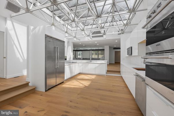 Glass Ceilings, Interior, Kitchen, Pendant Lights, Recessed Lighting, Stainless Steel Appliances, Wood Texture Flooring