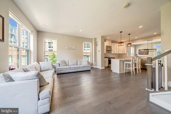 Dining room, Interior, Kitchen, Living room, Pendant Lights, Recessed Lighting, Stainless Steel Appliances, Wood Texture Flooring