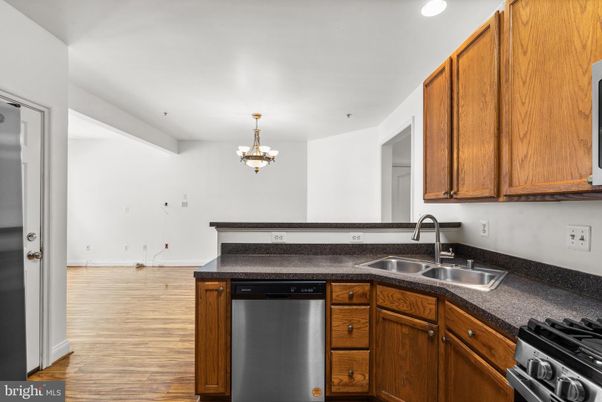 Chandelier, Interior, Kitchen, Recessed Lighting, Stainless Steel Appliances, Wood Texture Flooring