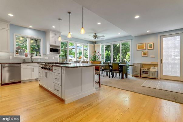 Dining room, Interior, Kitchen, Pendant Lights, Recessed Lighting, Stainless Steel Appliances, Wood Texture Flooring