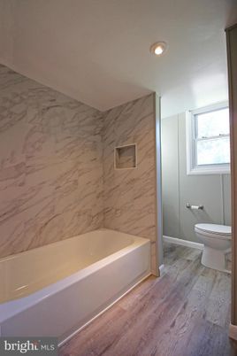 Bathroom, Interior, Marble Walls, Recessed Lighting, Wood Texture Flooring