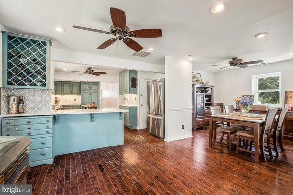 Dining room, Interior, Kitchen, Recessed Lighting, Stainless Steel Appliances, Wood Texture Flooring
