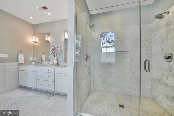 Bathroom, Dual Sink Vanities, Glass Shower, Interior, Marble, Marble Walls, Recessed Lighting