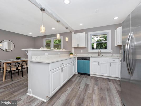 Dining room, Interior, Kitchen, Pendant Lights, Recessed Lighting, Stainless Steel Appliances, Wood Texture Flooring