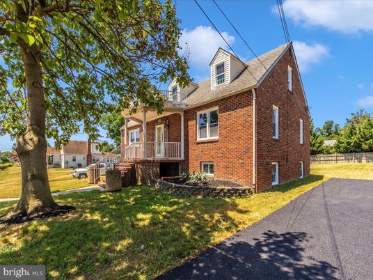 Exterior, Facade, Brick Facade, Cape Cod