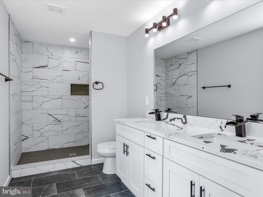 Bathroom, Dual Sink Vanities, Glass Shower, Interior, Marble Walls, Recessed Lighting