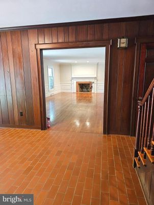 Empty room, Fireplace, Interior, Recessed Lighting, Wood Texture Flooring, Wooden Walls