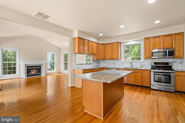 Fireplace, Interior, Kitchen, Recessed Lighting, Wood Texture Flooring