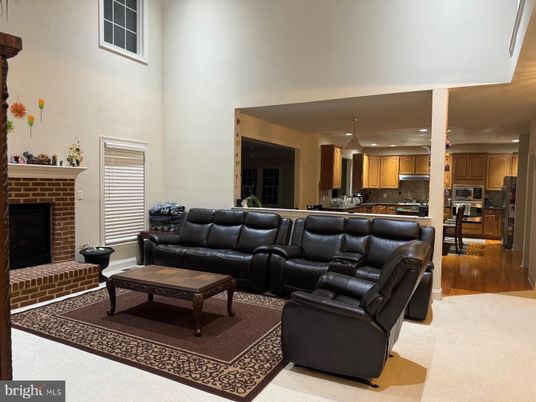 Fireplace, Interior, Kitchen, Living room, Pendant Lights, Recessed Lighting, Stainless Steel Appliances, Wood Texture Flooring
