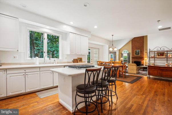 Dining room, Interior, Kitchen, Living room, Pendant Lights, Recessed Lighting, Stone Walls, Wood Texture Flooring