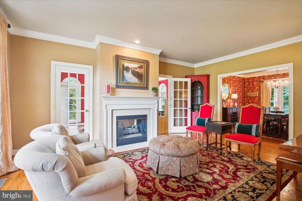 Chandelier, Dining room, Fireplace, Interior, Living room, Piano, Recessed Lighting, Wood Texture Flooring