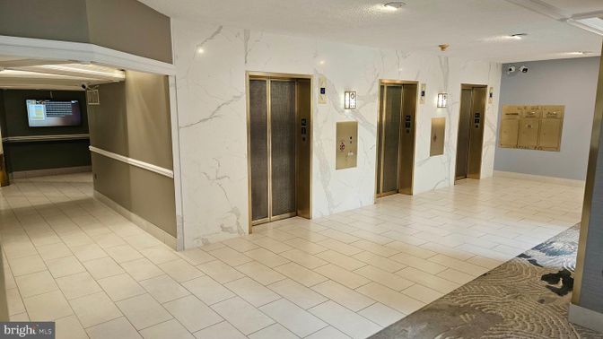 Elevator, Interior, Marble Walls, Recessed Lighting