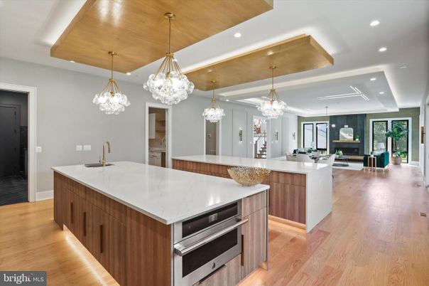 Chandelier, Interior, Kitchen, Pendant Lights, Recessed Lighting, Stainless Steel Appliances, Wooden Ceilings, Wood Texture Flooring