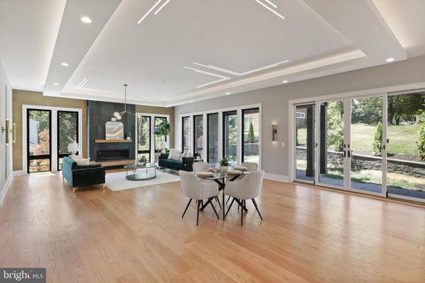 Dining room, Fireplace, Interior, Living room, Pendant Lights, Recessed Lighting, Wood Texture Flooring