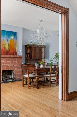 Chandelier, Dining room, Fireplace, Interior, Wood Texture Flooring