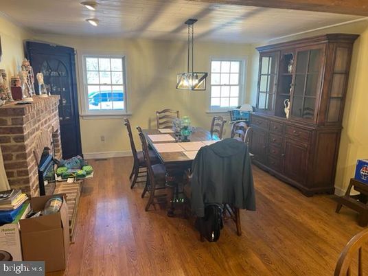 Dining room, Fireplace, Interior, Pendant Lights, Wood Texture Flooring