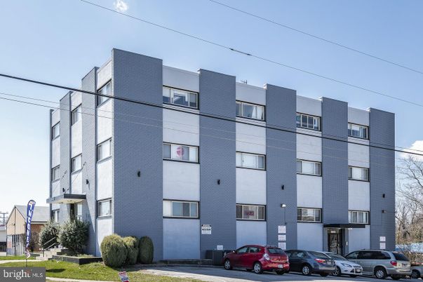 Exterior, Facade, Brick Facade, Condo Building