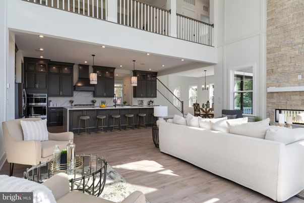 Dining room, Fireplace, Interior, Kitchen, Living room, Pendant Lights, Recessed Lighting, Stainless Steel Appliances, Stone Walls, Wood Texture Flooring