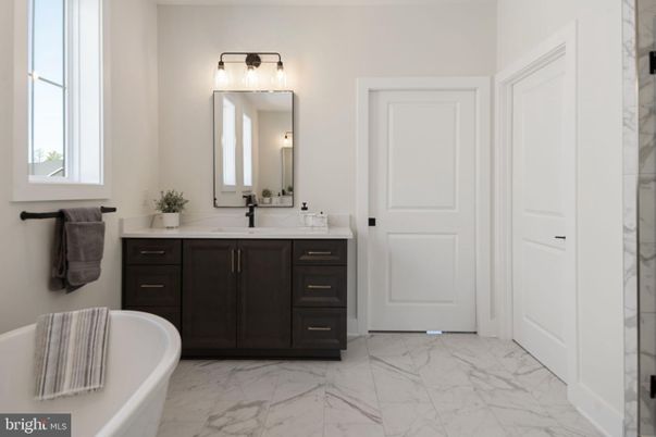 Bathroom, Dual Sink Vanities, Free Standing Baths, Interior, Marble, Marble Walls
