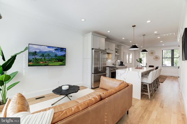 Dining room, Interior, Kitchen, Living room, Pendant Lights, Recessed Lighting, Stainless Steel Appliances, Wood Texture Flooring