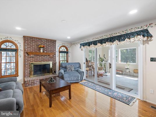 Fireplace, Interior, Living room, Recessed Lighting, Stone Walls, Wood Texture Flooring
