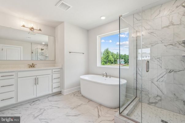 Bathroom, Free Standing Baths, Glass Shower, Interior, Marble, Marble Walls, Recessed Lighting