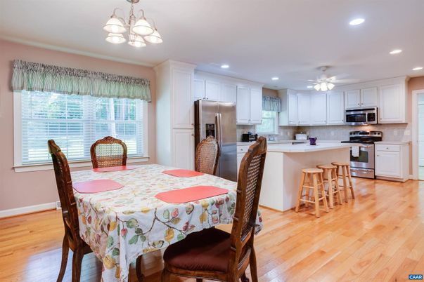 Dining room, Interior, Kitchen, Recessed Lighting, Stainless Steel Appliances, Wood Texture Flooring